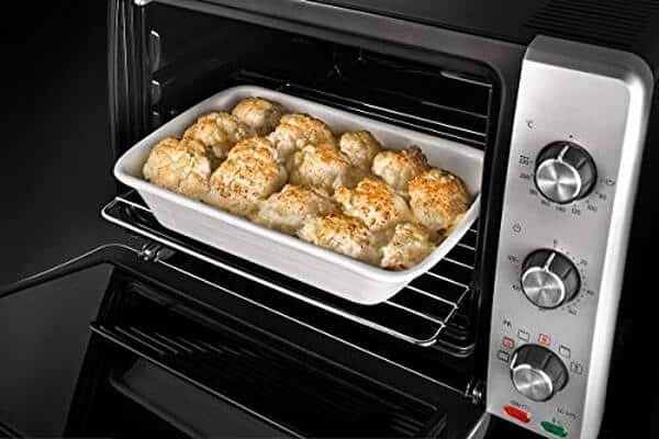 Découvrez notre avis détaillé sur le four électrique De'longhi Eo24752 : performances, design et fonctionnalités pour une cuisine professionnelle à domicile.